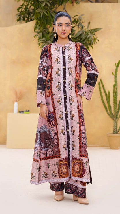 woman wearing matching traditional outfits with a decorative pattern, standing against a neutral background with plants.